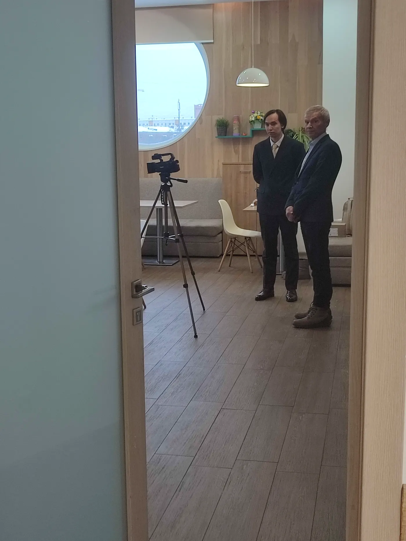 Guests and camera setup in the venue lounge